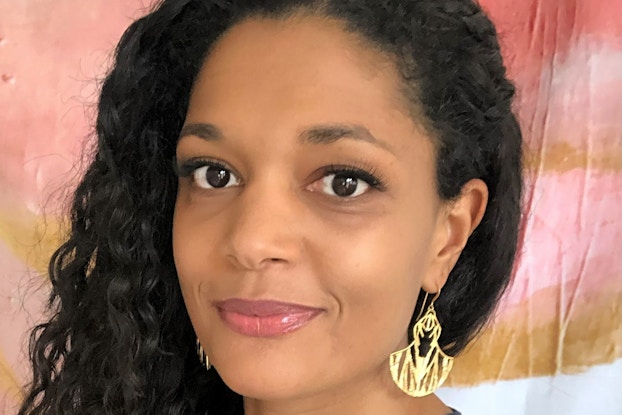 Headshot of Nicole Alesi, Founder of Nicole Marie Paperie.